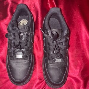 Nike Kids Black Sneakers with Silver Accents